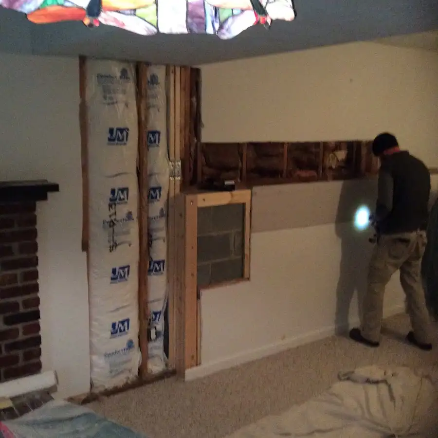 Restoration technician inspecting water damage in Berkeley Heights